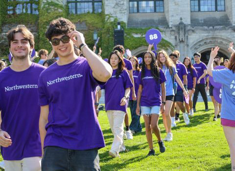 students walking on deering meadow